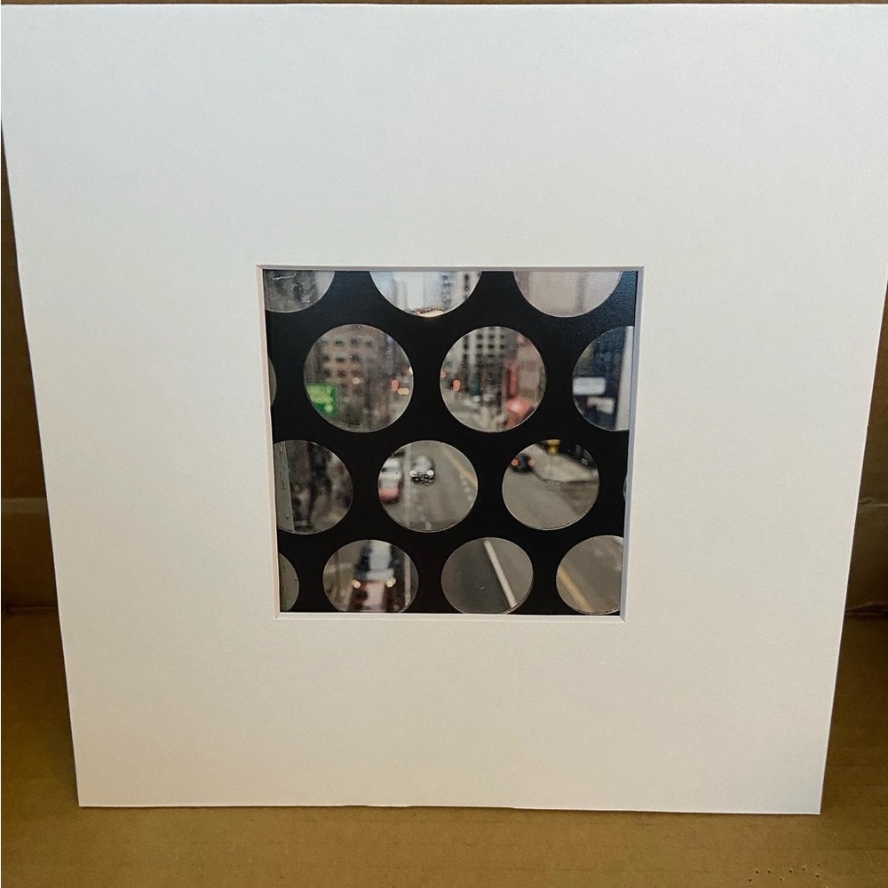 L of a view 4x4 photo by ChiGalArt in 8x8inch matting